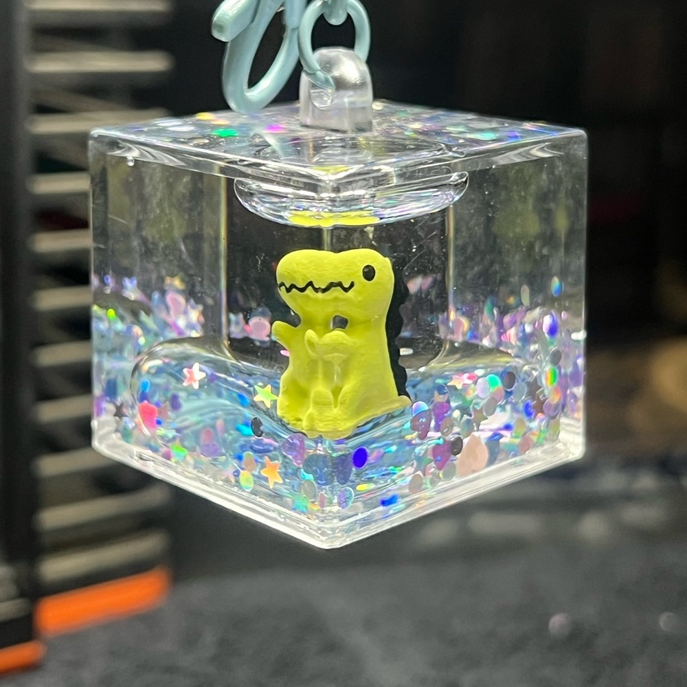 Claire's Dino Cube Keychain with Glitter